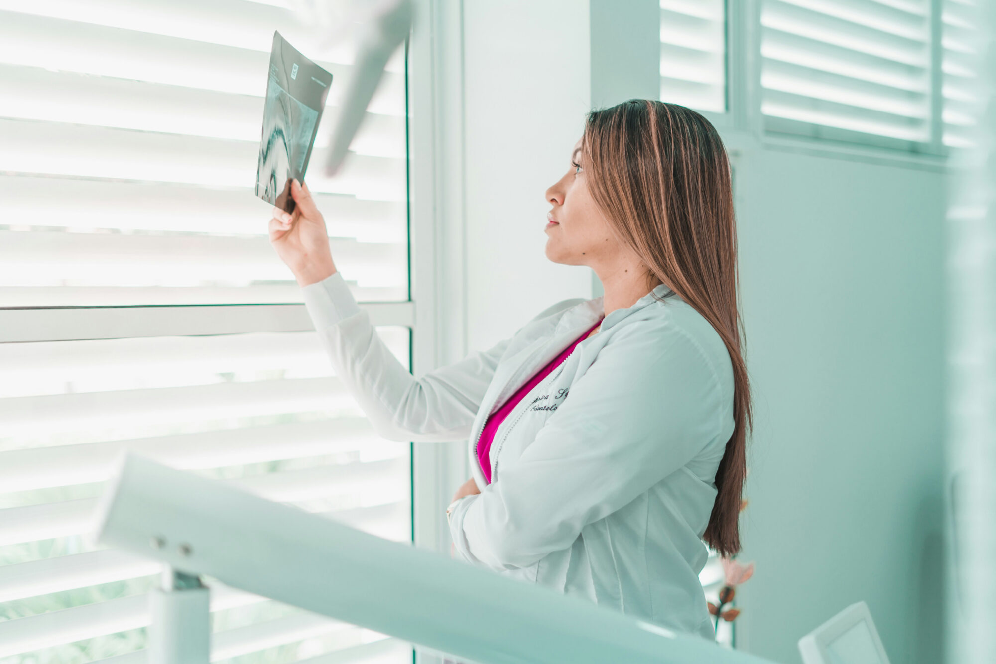 dentist holding x-ray